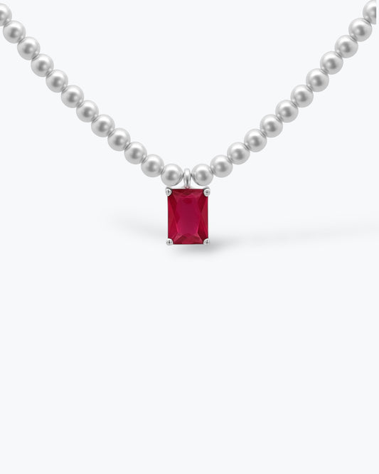 COLLANA DI PERLE CON PENDENTE COLOR RUBINO