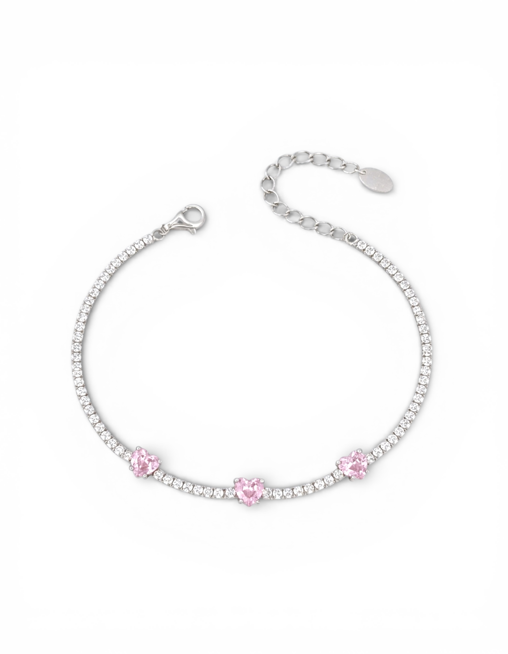 Bracciale tennis regolabile in argento 925 rodiato con zirconi bianchi e tre pietre centrali a forma di cuore rosa su sfondo bianco.