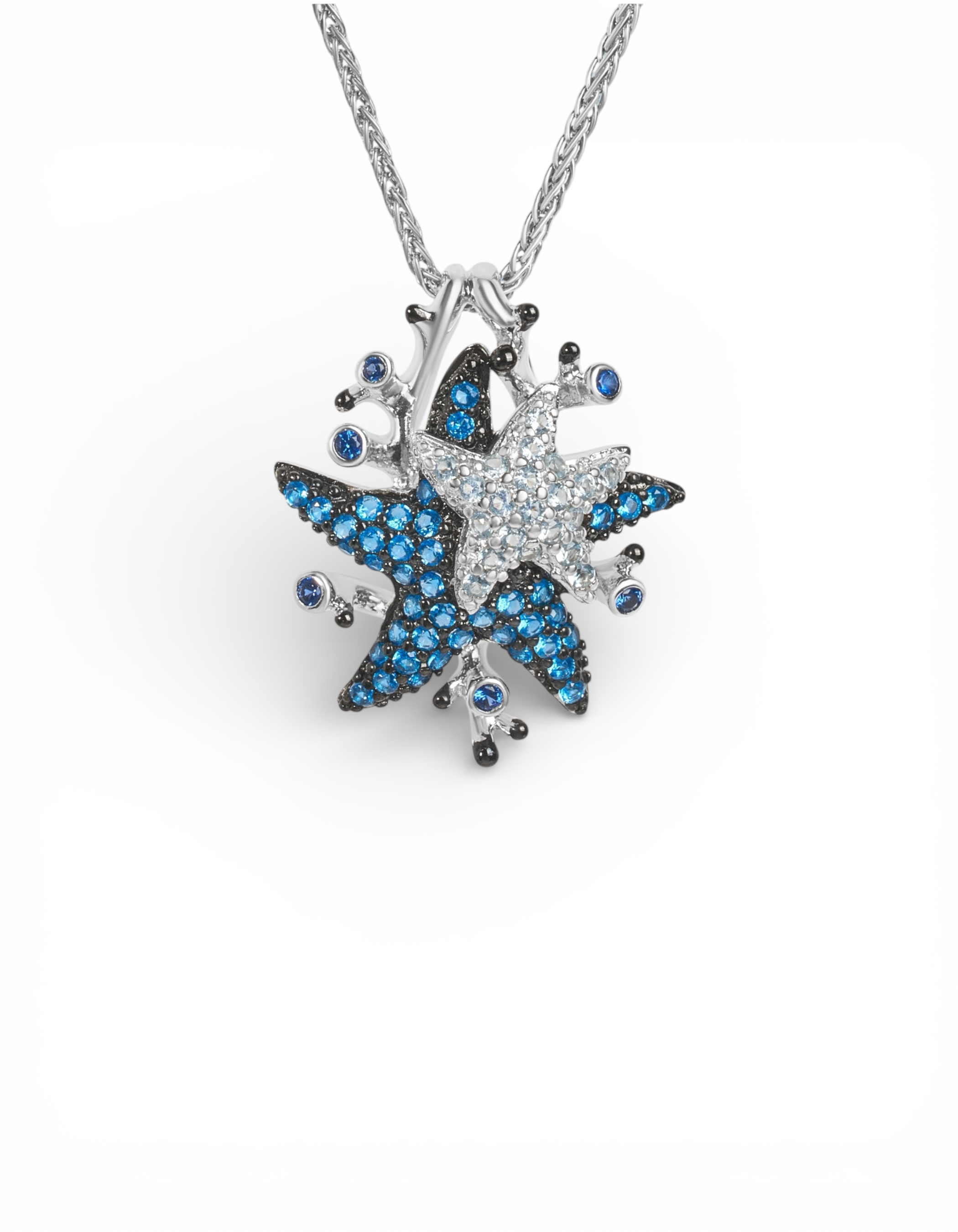 Collana in argento 925 con catena a treccia e ciondolo a forma di doppie stelle marine sovrapposte in pavé di zirconi blu e bianchi con coralli Di Luce Bijoux