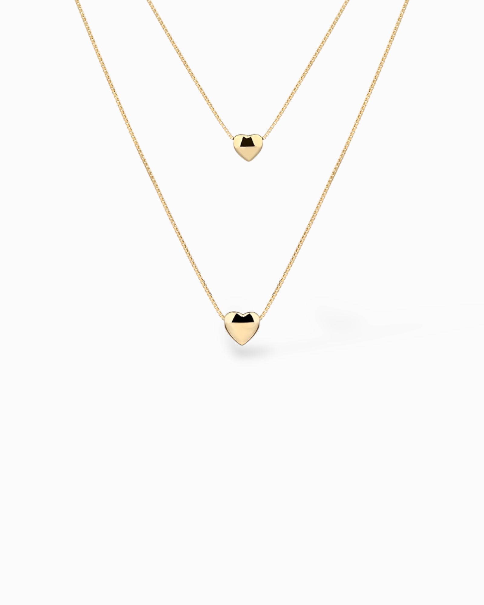 COLLANA GIROCOLLO IN ARGENTO 925 PLACCATA ORO CON DUE CUORI PASSANTI